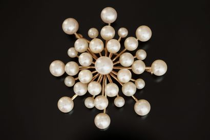 14K (585/°°) yellow gold shell-marked sun-shaped...