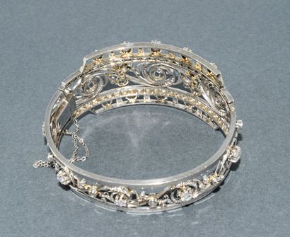 BRACELET jonc ouvrant en or blanc 18K (750/°°)...