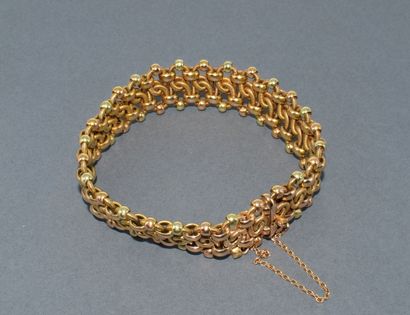 BRACELET in 18K (750/°°) yellow gold, hallmarked...