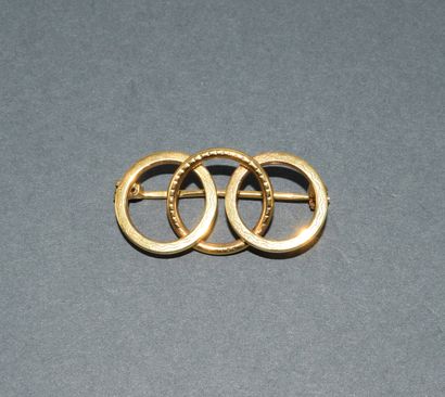 BROCHE en or jaune 18k (750/°°) poinçon tête...