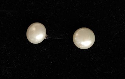 Pair of white freshwater button pearl earrings...