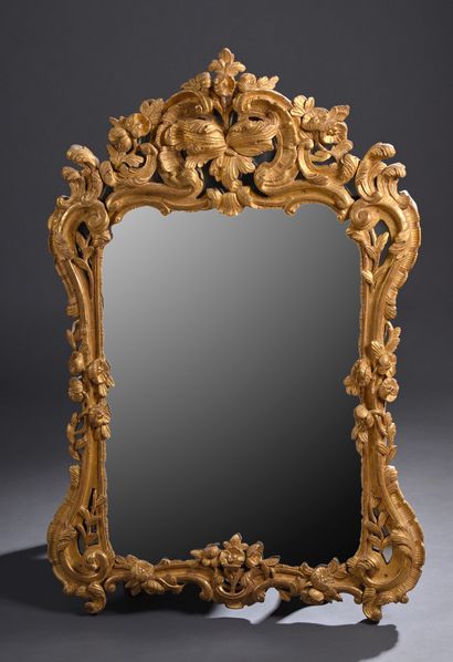 * Louis XV period mirror
In gilded wood with...