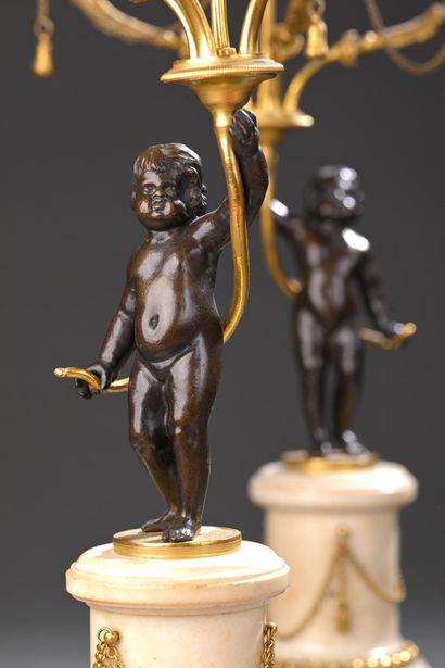 * Pair of late 18th-century candelabras.
With...