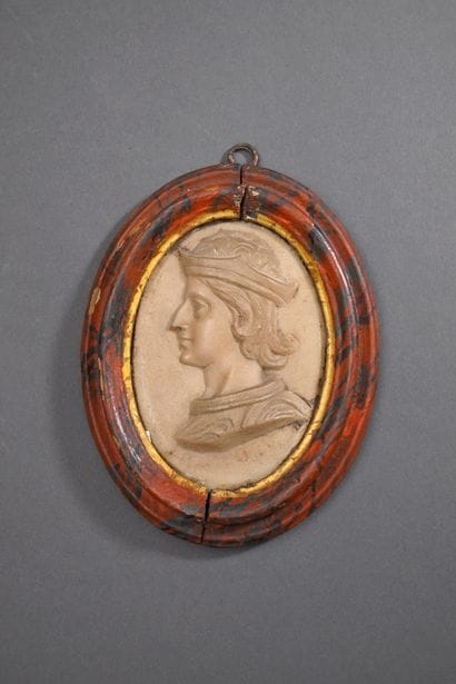 * Carved marble relief depicting Emperor...
