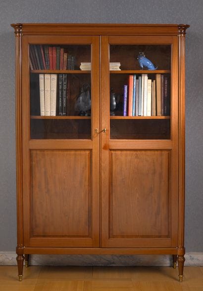 * Solid molded mahogany bookcase from the...