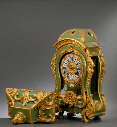 Louis XV period wall-mounted cartel 
In painted...