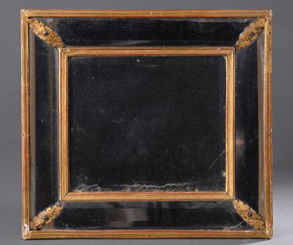 * Mirror, 18th century 
In wood and gilded...