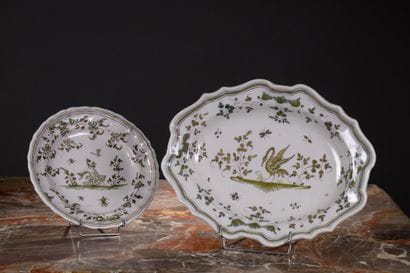 Hollow oval dish in Moustiers earthenware,...