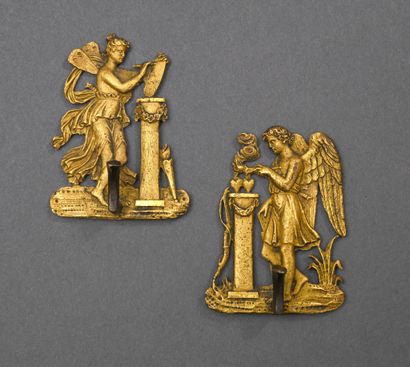 * Pair of pitons, 19th century. 
Gilt bronze...