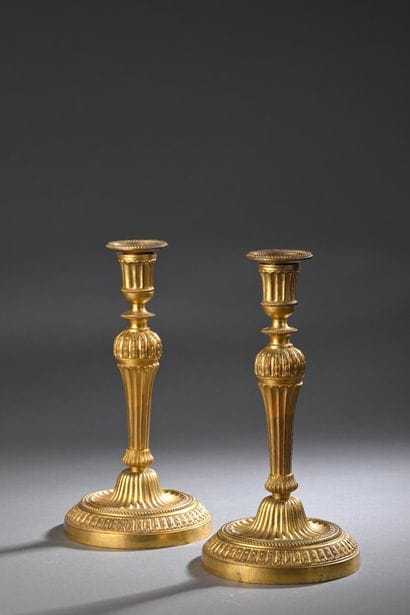 * Pair of Louis XVI period torches 
In chased...