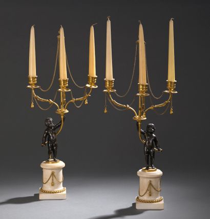 * Pair of late 18th-century candelabras.
With...