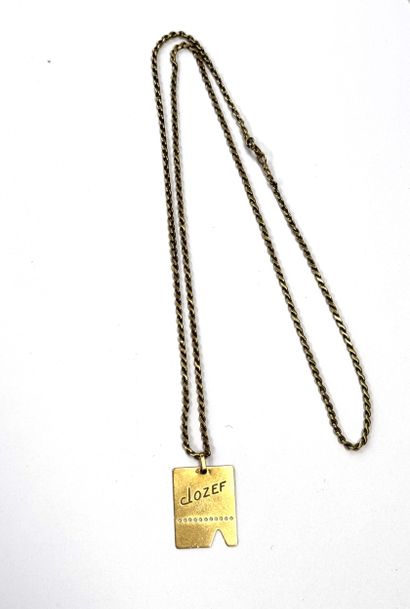CHAINE ET SA PLAQUE en or jaune 18k (750/°°)...
