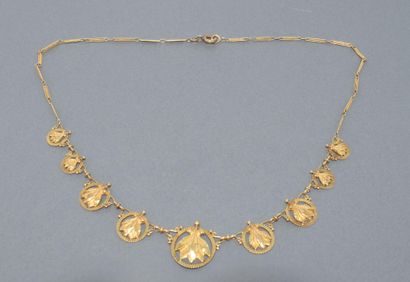 COLLIER DRAPERIE en or jaune 18k (750/°°)...