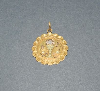 MEDAILLE en or jaune 18k (750/°°) figurant...