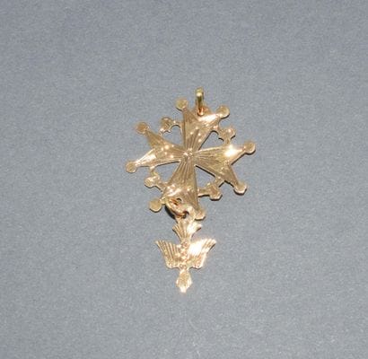 PENDENTIF en or jaune 18k (750/°°) figurant...