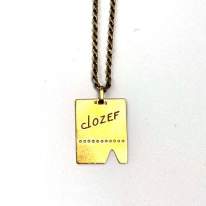 CHAINE ET SA PLAQUE en or jaune 18k (750/°°)...