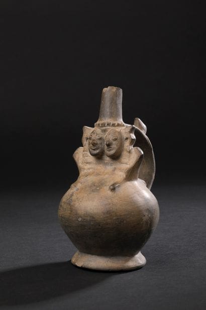 Vase with handle decorated at the base with...