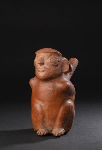 Anthropomorphic vase depicting a seated
seated...