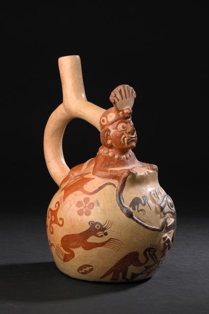 Stirrup handle vase decorated with a mythical...