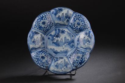 Delft
Round dish with gadrooned rim decorated...