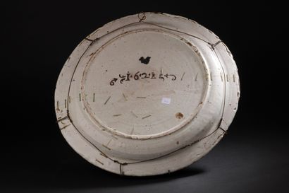 Castelli
Large round dish with polychrome...