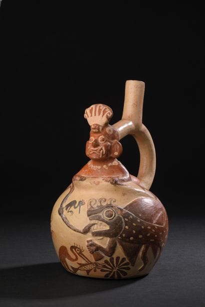 Stirrup handle vase decorated with a mythical...