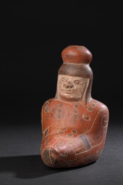 Ceremonial anthropomorphic vase representing-
a...