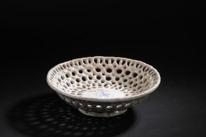 Faenza
Earthenware openwork bowl with blue...