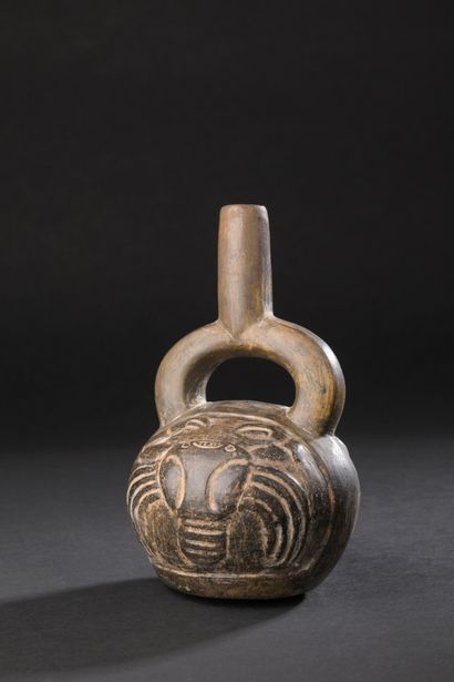 Stirrup-shaped vase decorated on the belly...