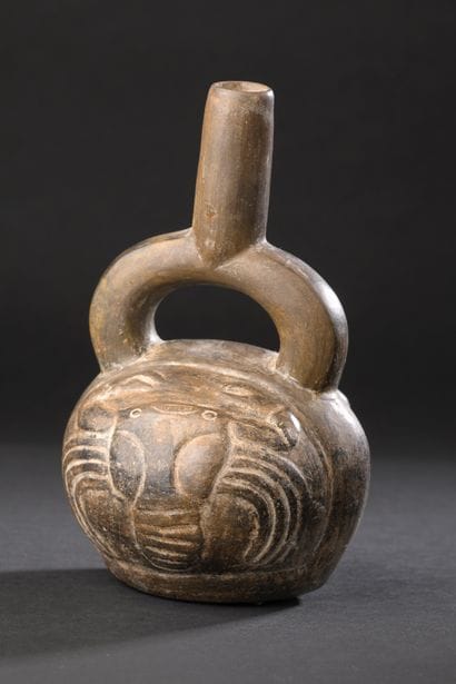 Stirrup-shaped vase decorated on the belly...