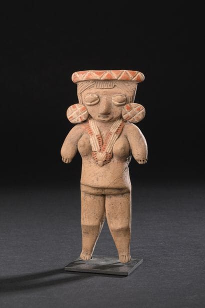 Venus stands naked and richly adorned.
She...