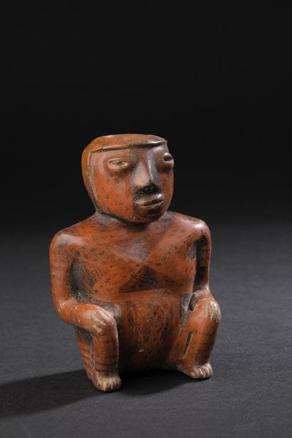 Anthropomorphic vase representing a small
hands...