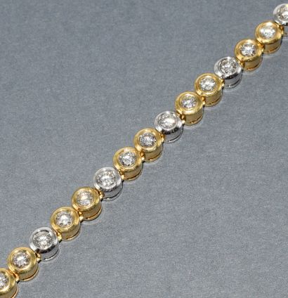 BRACELET RIVIÈRE en or deux tons 18k (750/°°)...