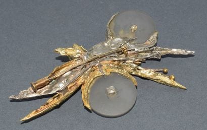 BROCHE en or jaune 18k (750/°°) et argent...