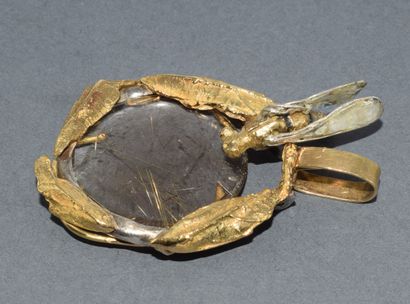 PENDENTIF en or jaune 18k (750/°°) et argent...