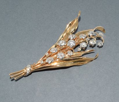 BROCHE en or jaune 18k (750/°) et platine...