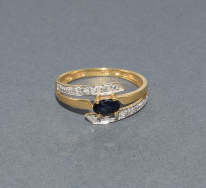 BAGUE en or jaune 18k (750/°°) ornée d’un...