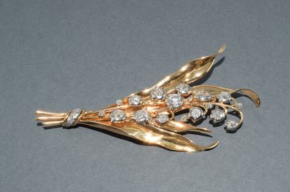 BROCHE en or jaune 18k (750/°) et platine...