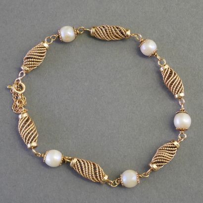 BRACELET in 18k (750/°°) yellow gold with...