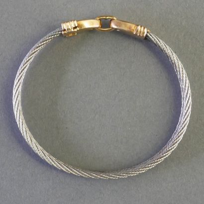 SEMI-RIGID opening BRACELET in twisted steel...
