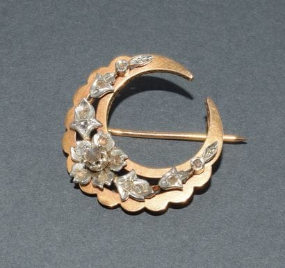 18k (750/°°) yellow gold and silver moon...