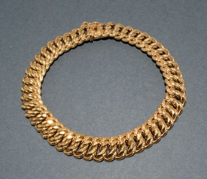 BRACELET in 18k (750/°°) yellow gold with...