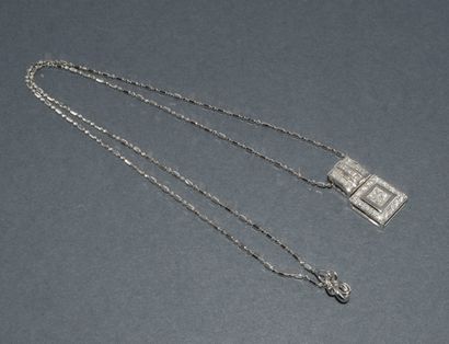 COLLIER en or blanc 18k (750/°°) retenant...