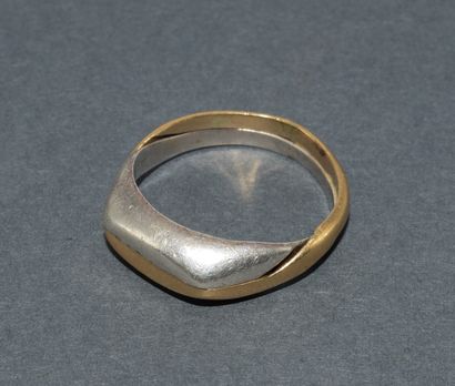 Lot of 2 tangled rings in 18k yellow gold...