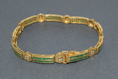 BRACELET in 18k (750/°°) yellow gold adorned...