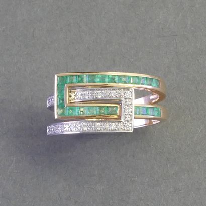 18k (750/°°) yellow and white gold CROSSED...