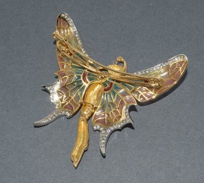 18k (750/°°) yellow gold and platinum brooch...