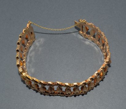 BRACELET in 18k (750/°°) yellow gold adorned...