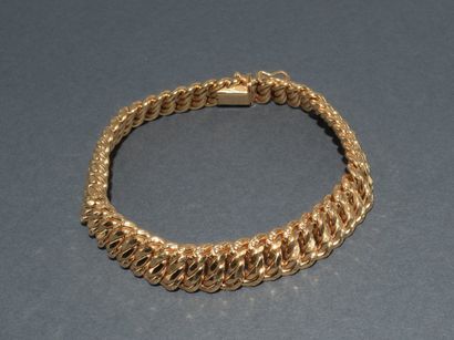 BRACELET in 18k (750/°°) yellow gold, American...