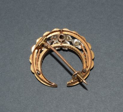 18k (750/°°) yellow gold and silver moon...